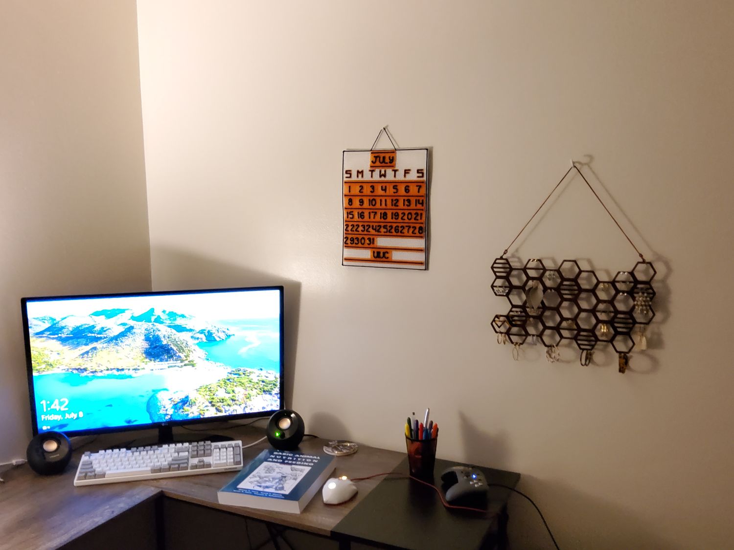 Custom Craft Calendar Primary: White, Orange. Secondary: Navy Blue. (Photo Of Calendar In Use)