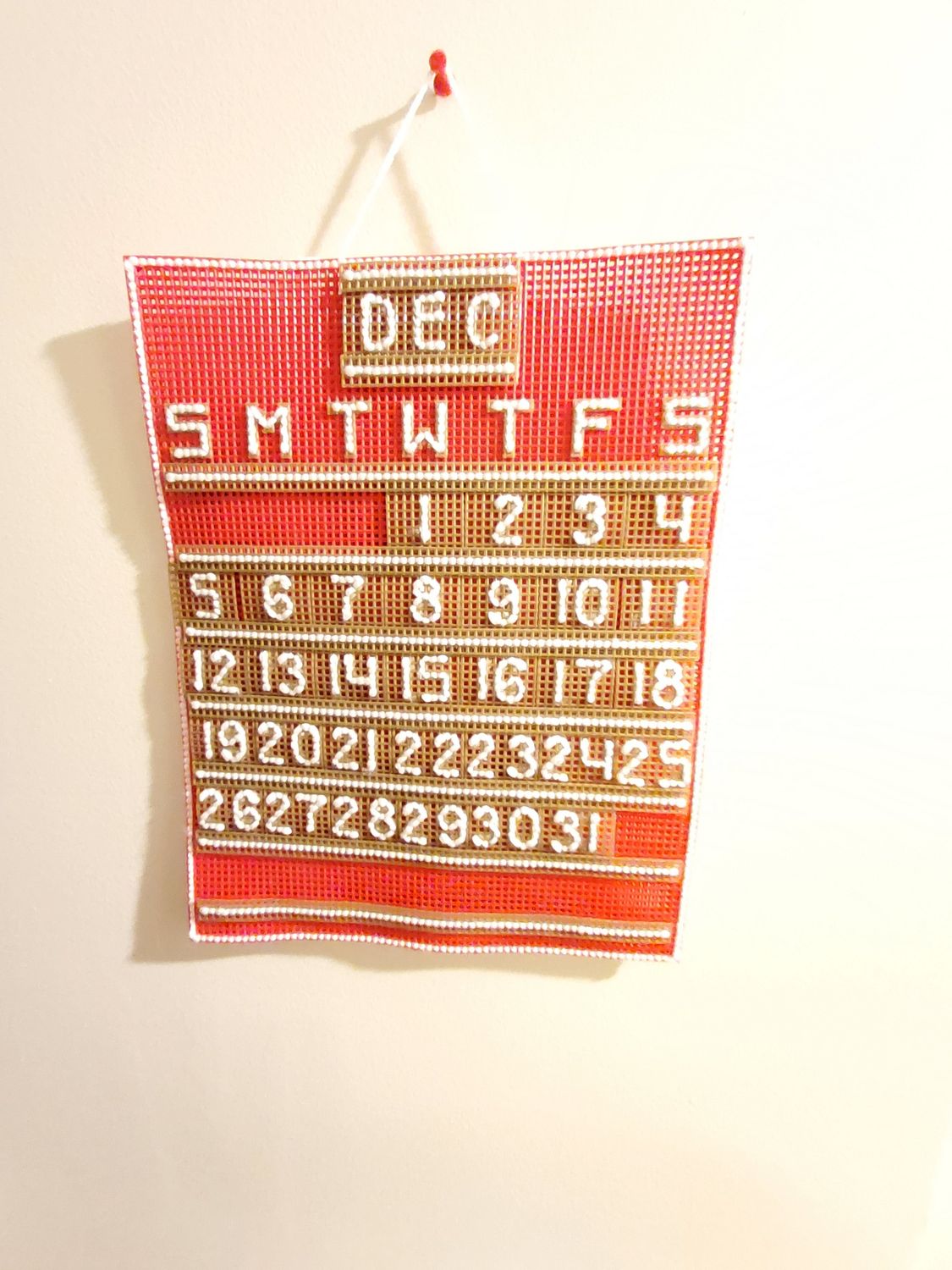 Custom Craft Calendar Primary: Red, Gold. Secondary: White