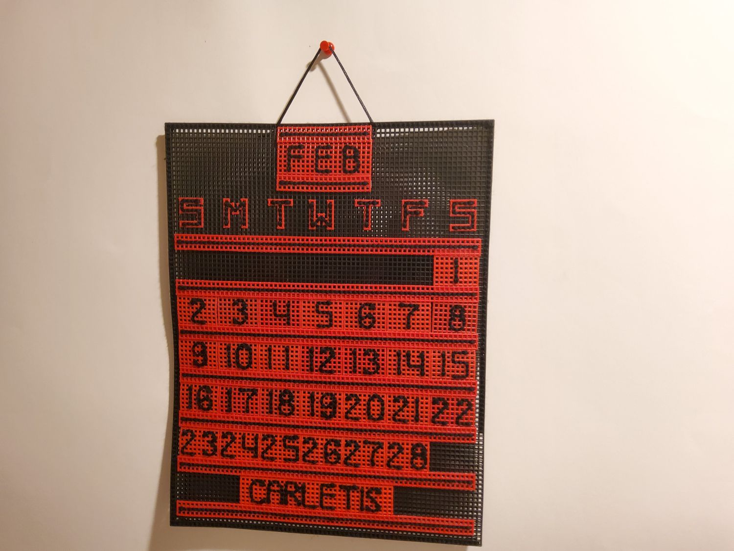 Custom Craft Calendar Primary: Black, Red. Secondary: Black.