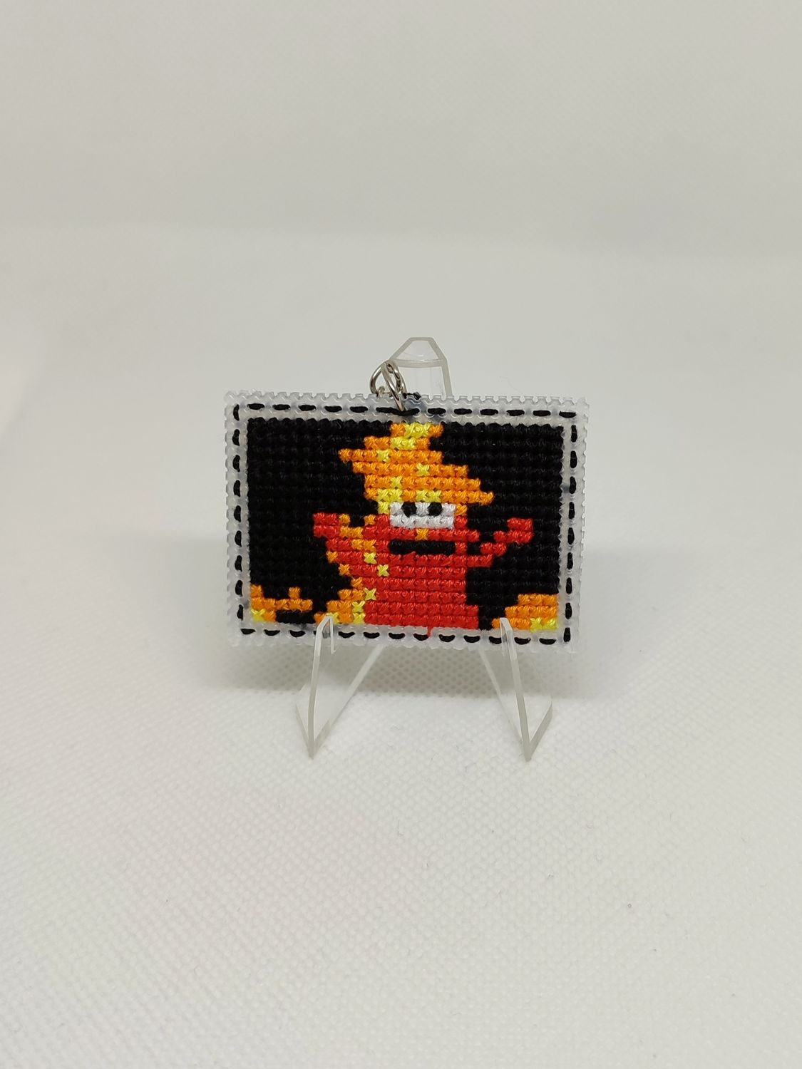 Breloczek Elmo w ogniu