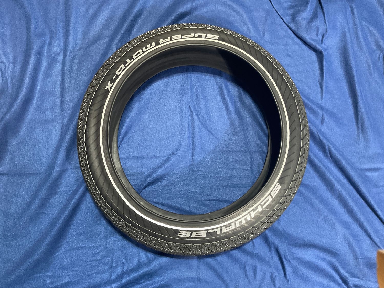 Super Moto-X E50 Tire, 20x4.0&quot;, 2x67 Tpi, Perf, Black
