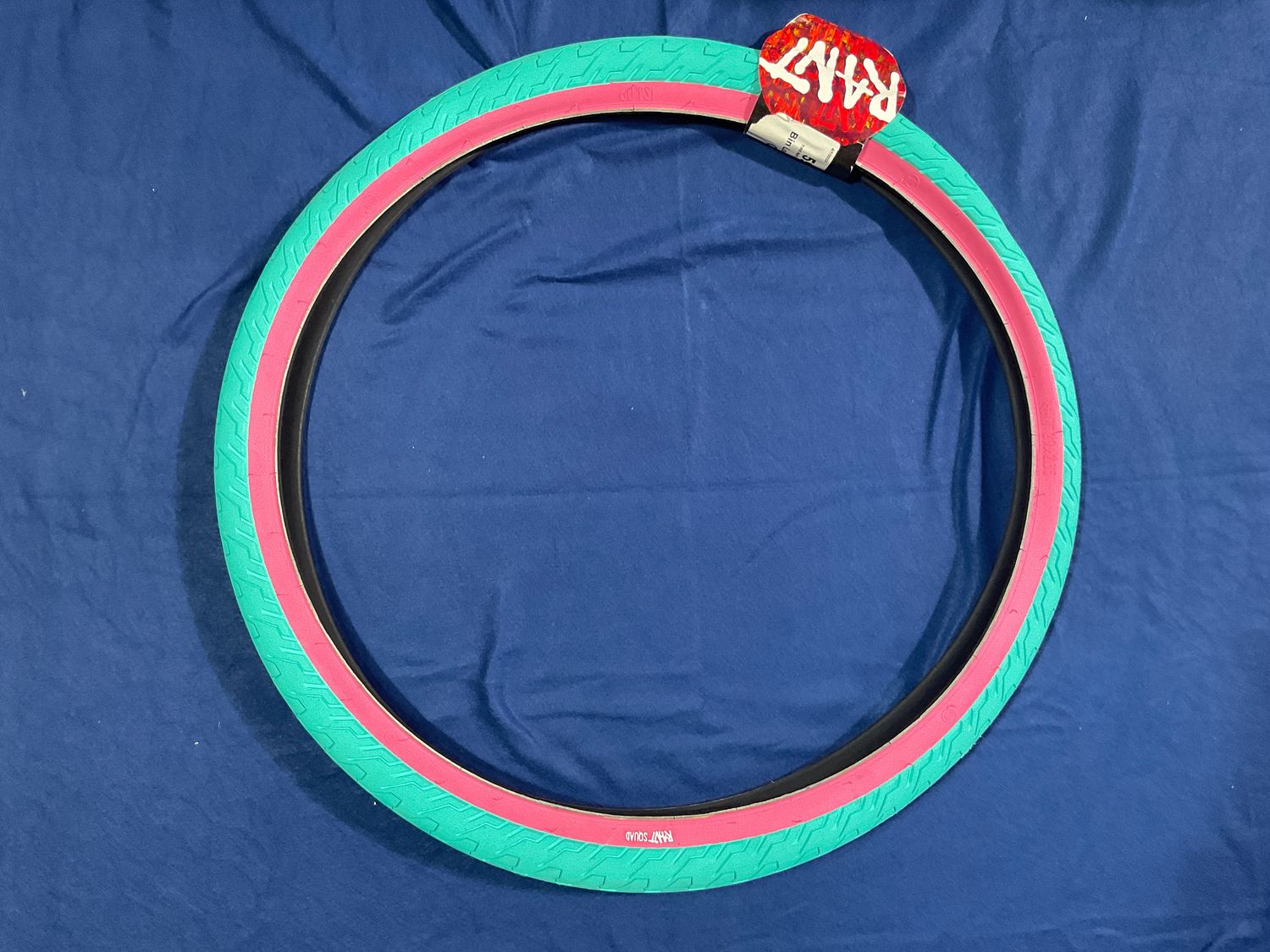 TIRE 29x2.35 TEAL/PK RANT SQUAD WIRE