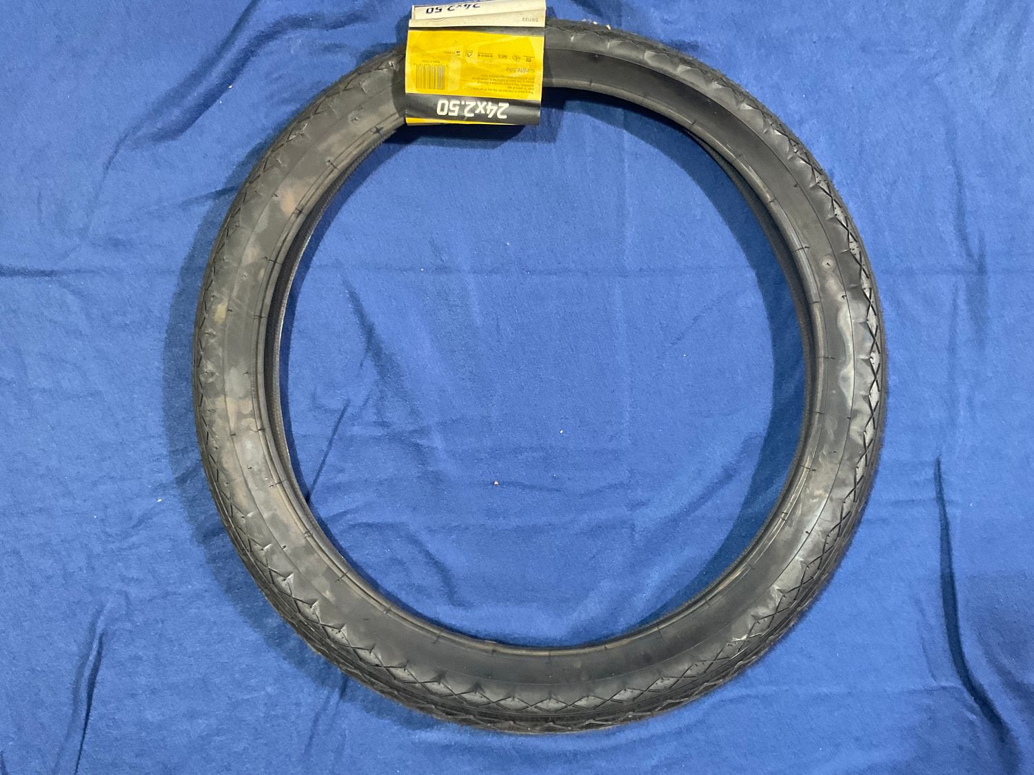 TIRE 24x2.5 BK/BK REV WIRE SUNLT
