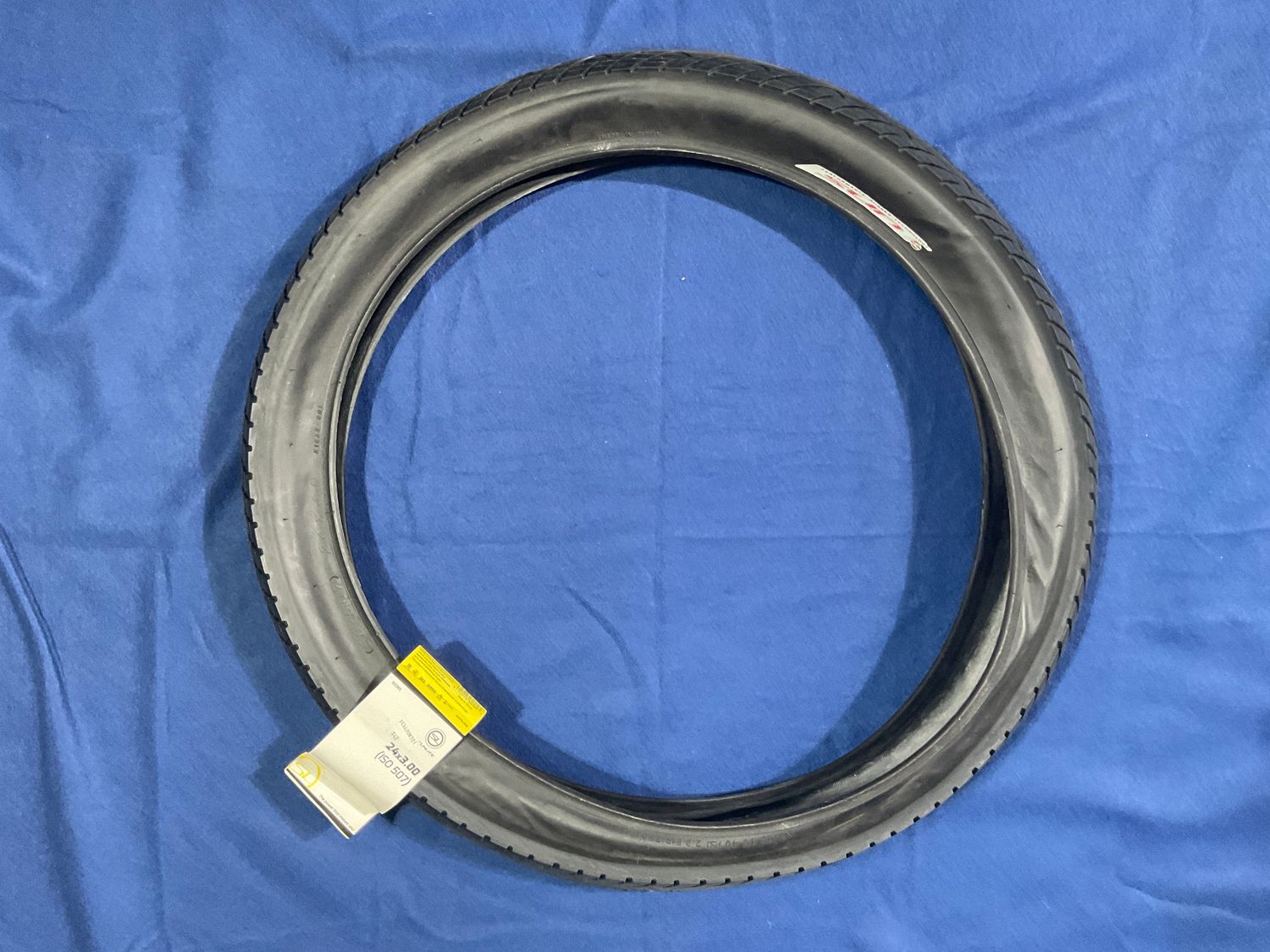 TIRE SUNLT 24x3.0 BK/BK SLICK K1032 WIRE