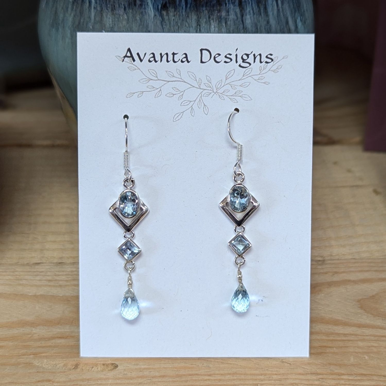 Sterling Silver Faceted Blue Topaz Triple Stone Earrings