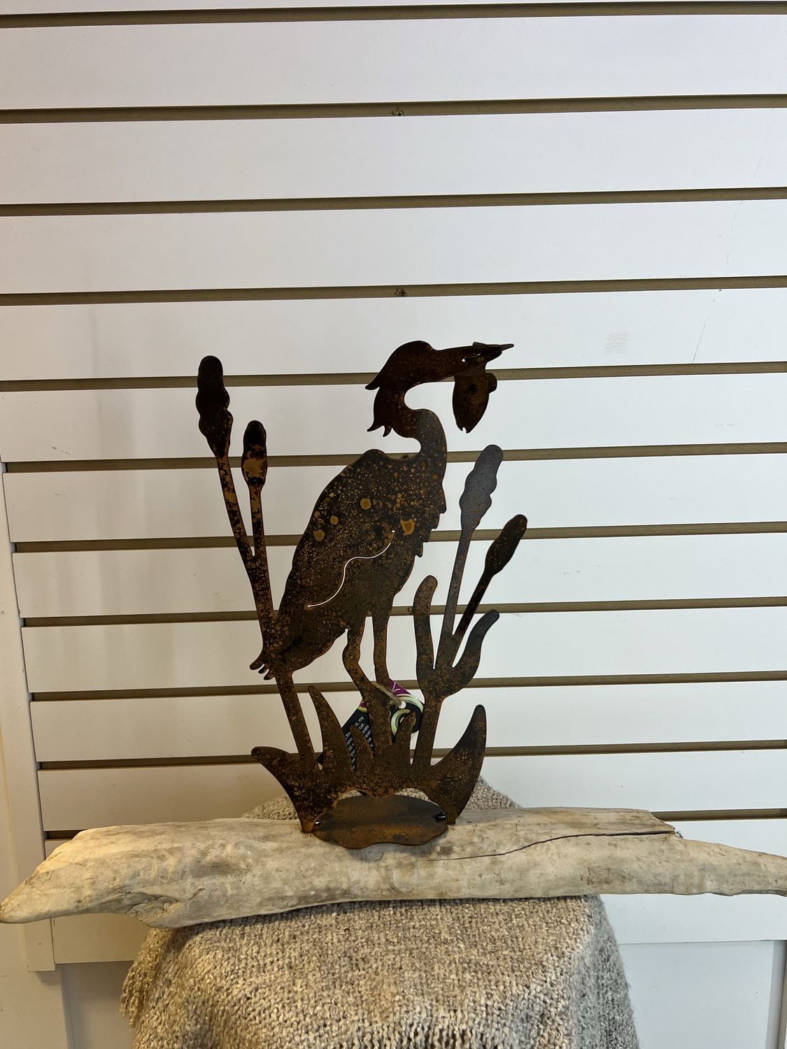Small Rusted Heron On Driftwood