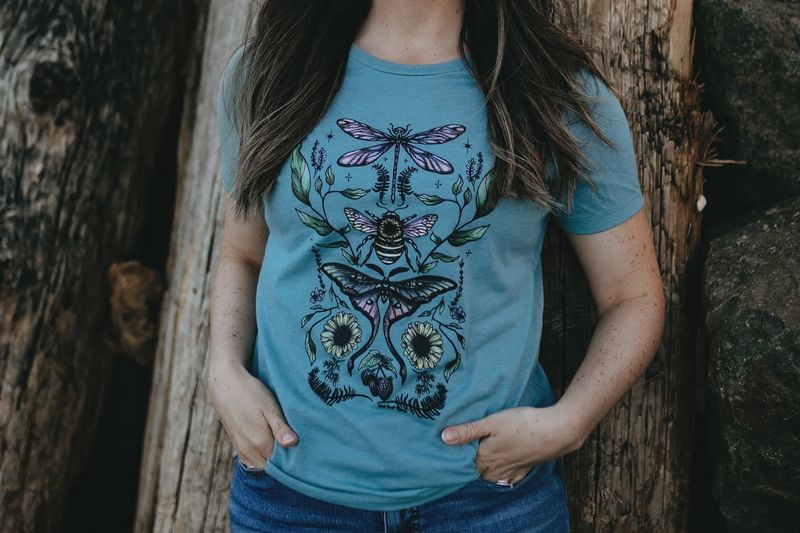 Flying Fauna Relaxed Fit Tee in Heather Blue Lagoon