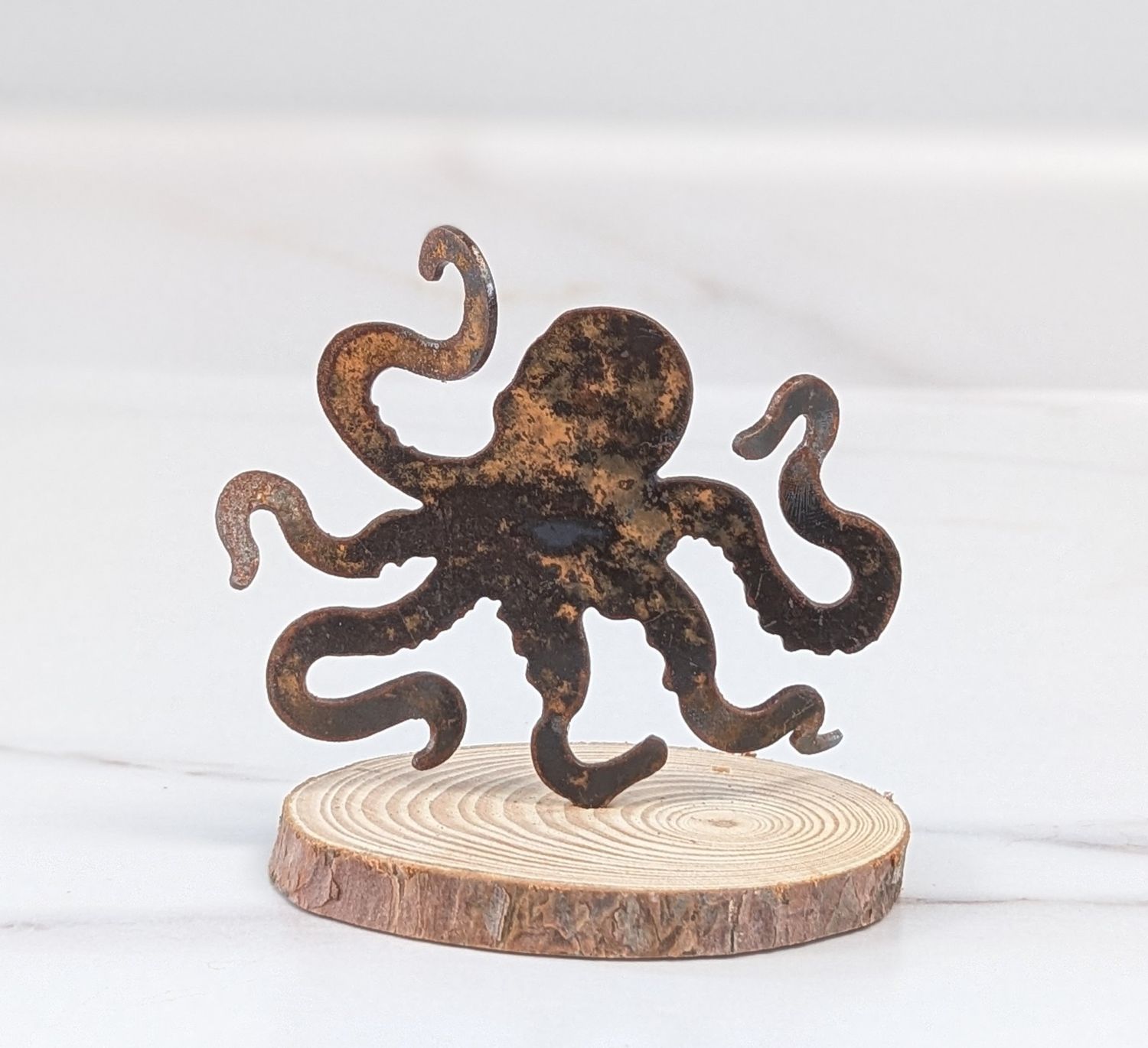 Mini Rusted Metal Octopus on Log