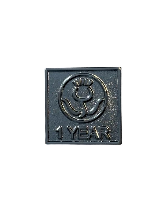 GGS 1 year service metal badge