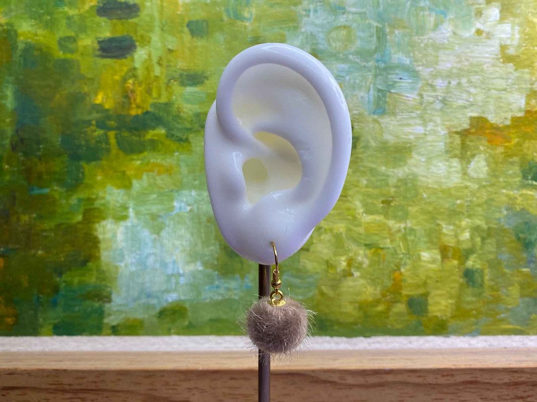 Arete pompón