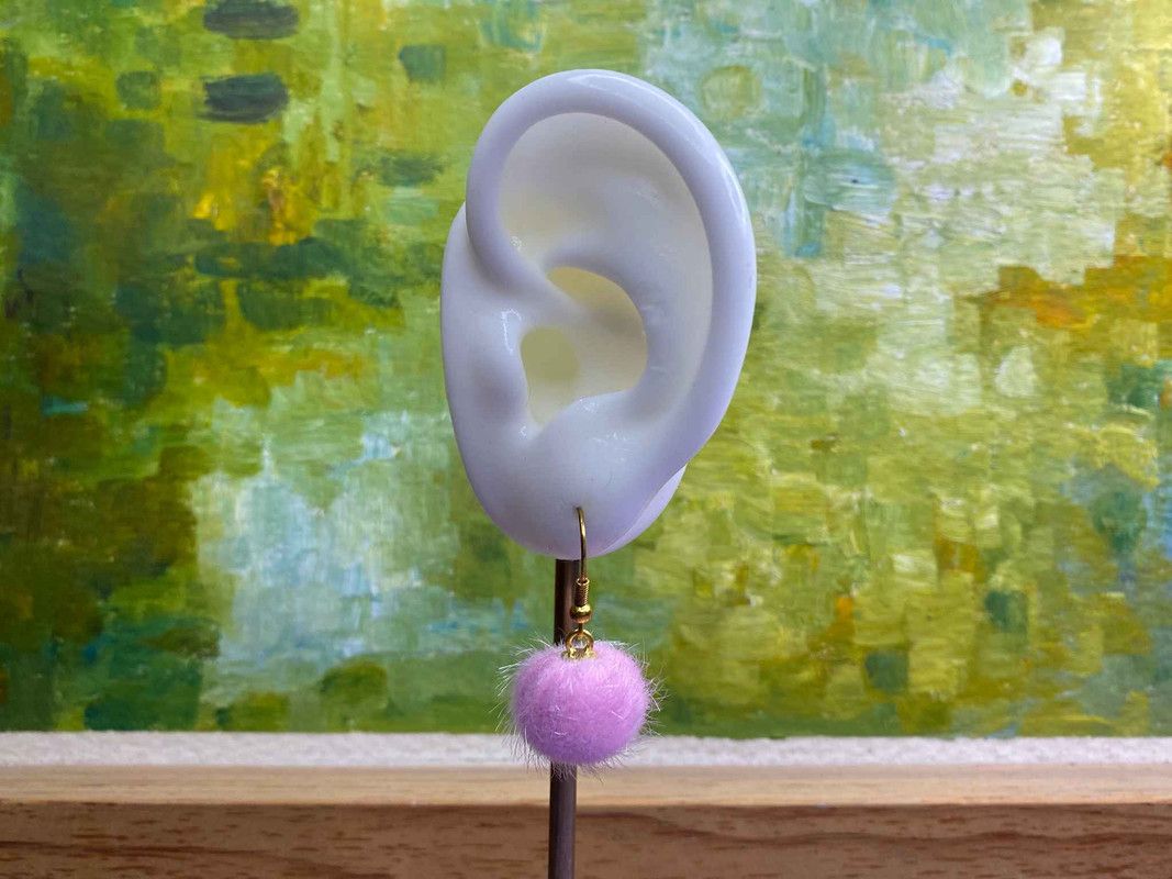 Arete pompón