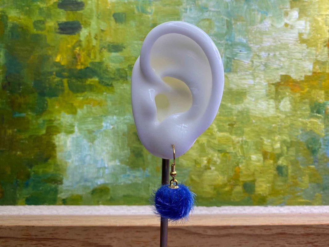 Arete pompón