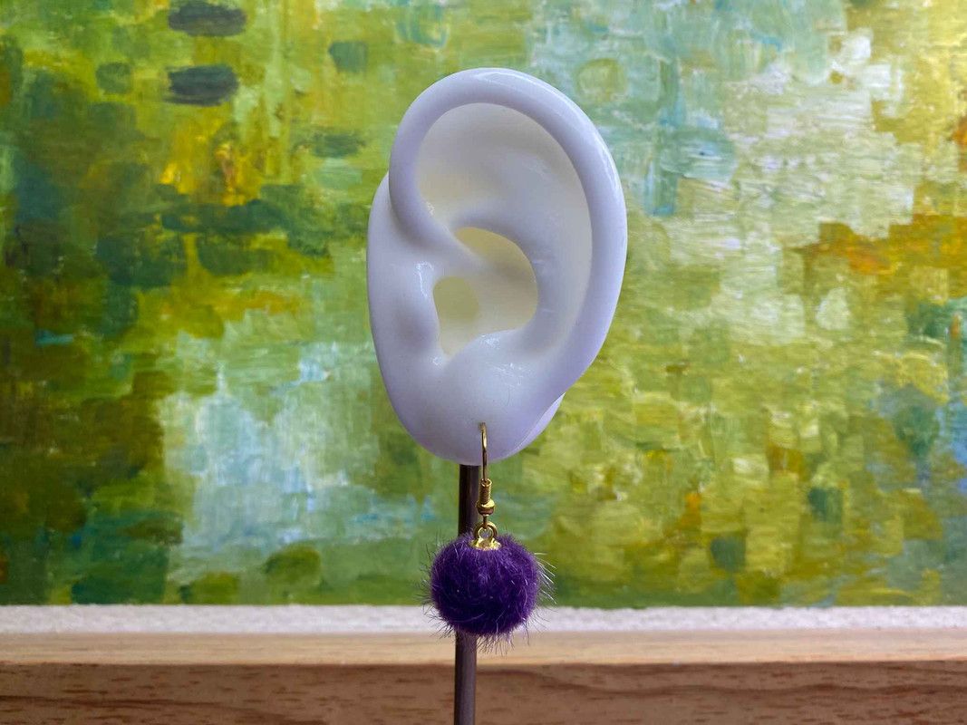Arete pompón