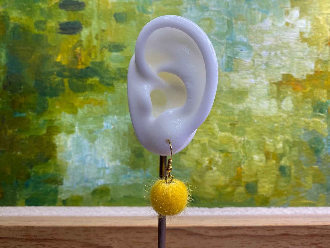 Arete pompón