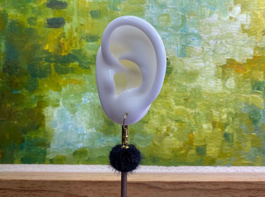 Arete pompón
