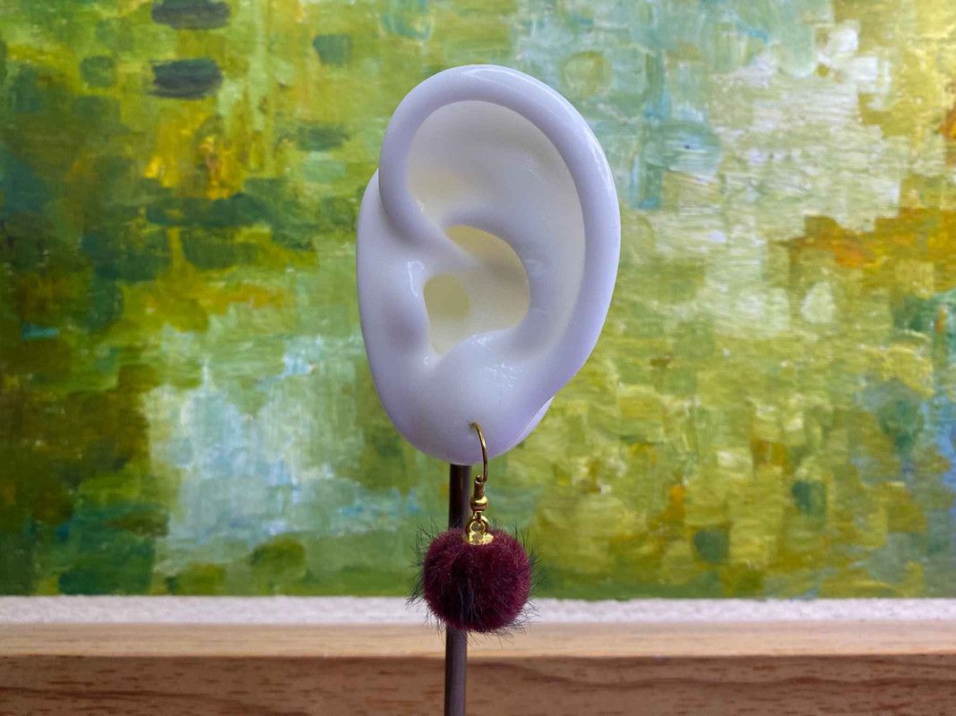 Arete pompón
