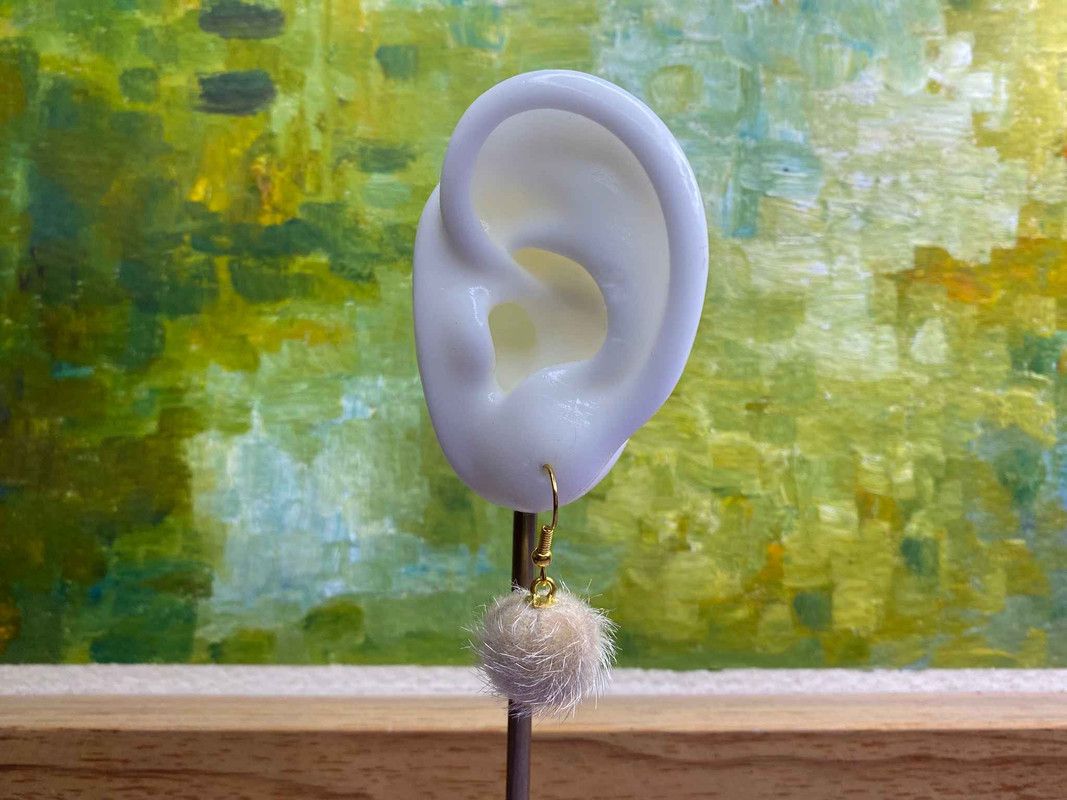 Arete pompón