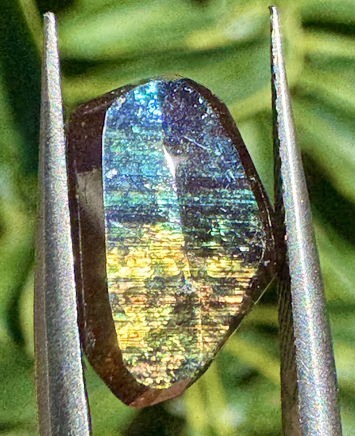 Checkerboard-Faceted Rainbow Garnet – San Pedro Mountain, Santa Fe Co., New Mexico  4.65 carats | 12.25 mm x 8.08 mm x 4 mm