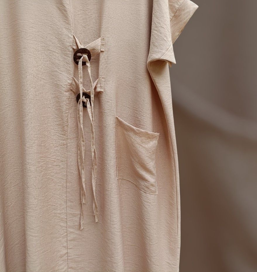 Vestido beige lazos