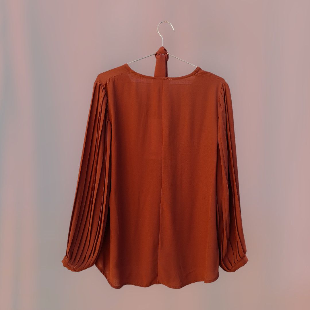 Blusa mangas plisadas