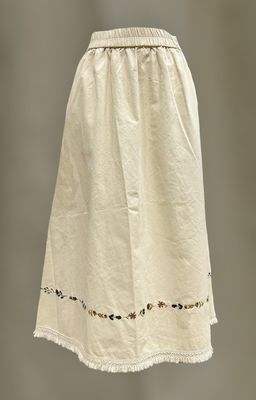 Falda beige bordados