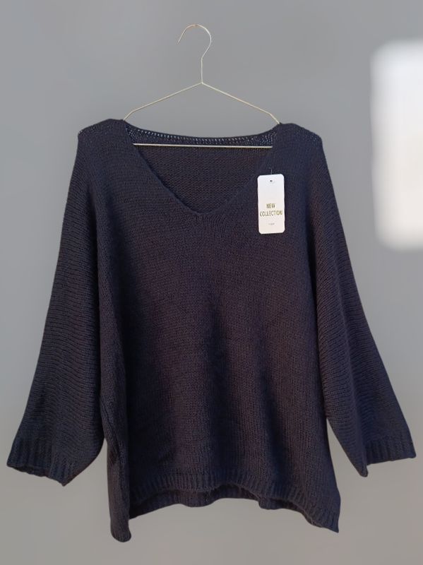 Jersey mangas murciélago negro