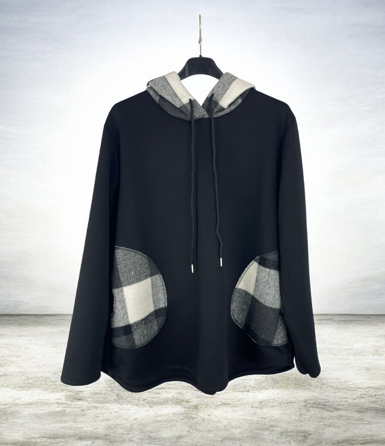 Sudadera bolsillos cuadros