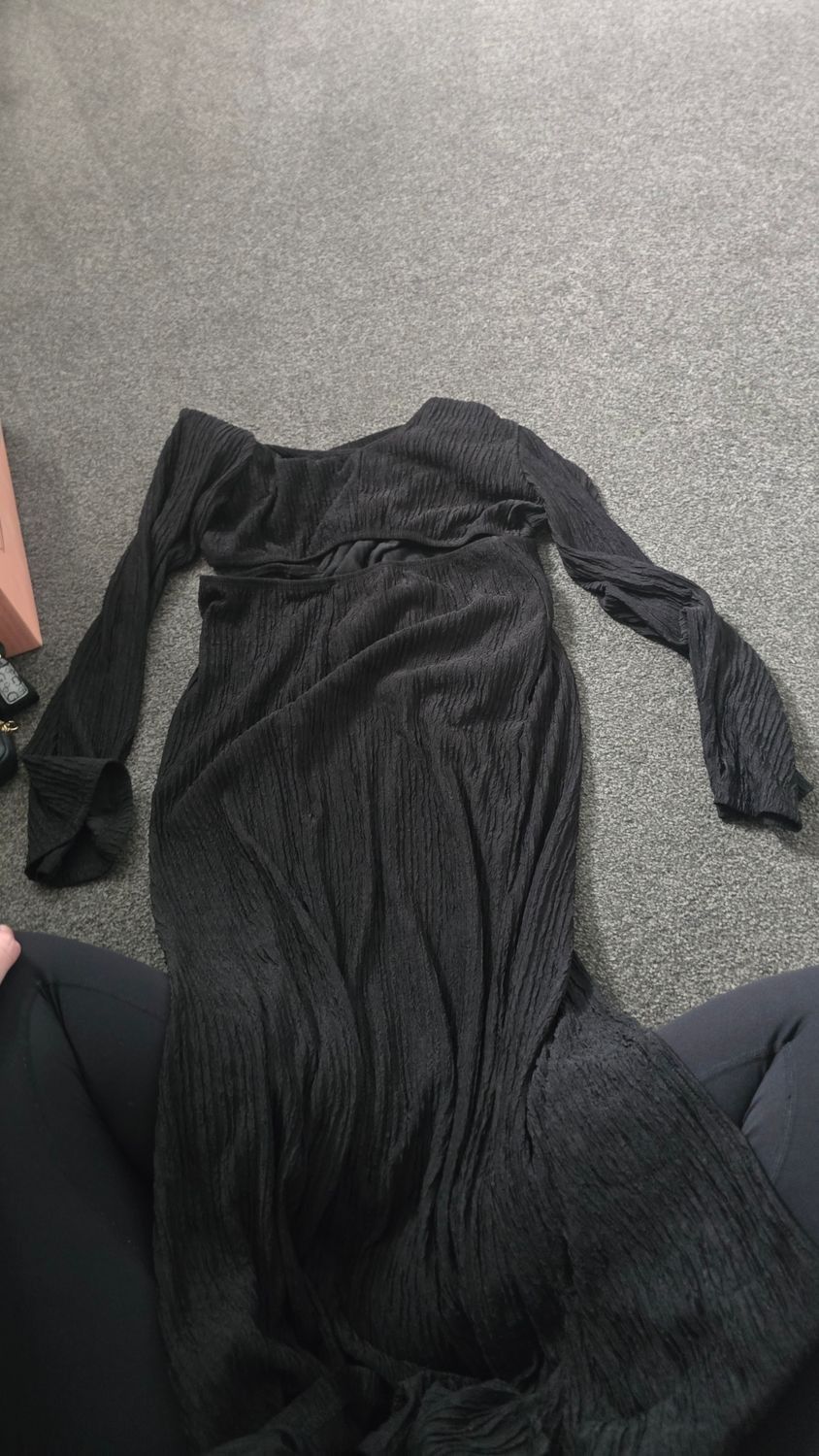 Really cool dress more a size 14