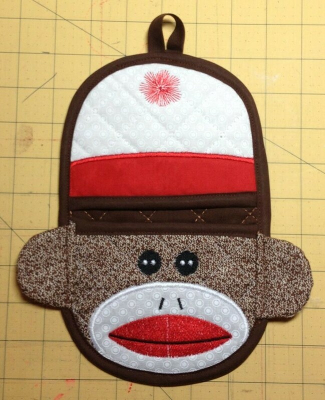 Sock Monkey oven mitt machine embroidery in the hoop design
