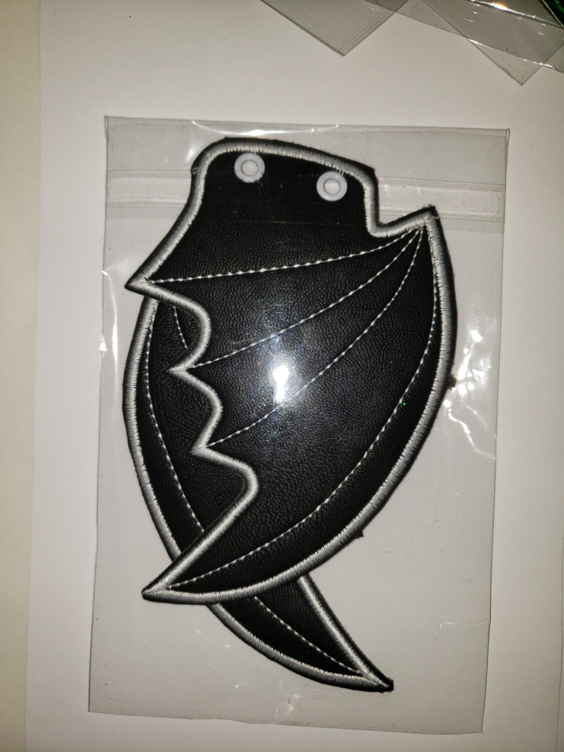 Bat skate wings in black with white stitching