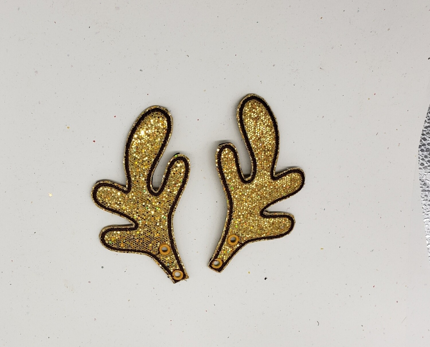 Reindeer antlers skate wings in gold glittery fabric rts