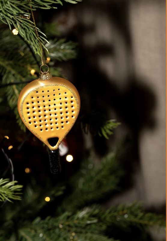 padelracket goud - yup in de boom