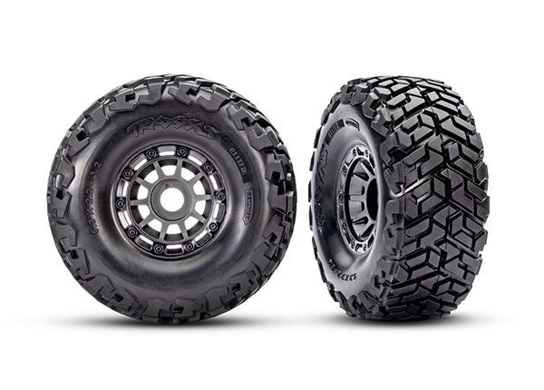 Traxxas Tires &amp; wheels, assembled, glued, left (1), right (1) (charcoal gray wheels, Maxx Slash belted tires, foam inserts) (17mm splined) (TSM rated)