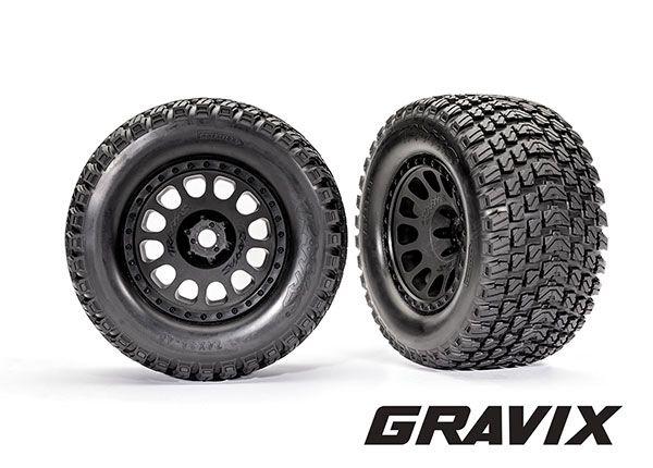 Traxxas Tires &amp; wheels, assembled, glued (XRTÔøΩ Race black wheels, GravixÔøΩ tires, foam inserts) (left &amp; right)