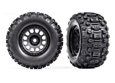 Traxxas Tires &amp; wheels, assembled, glued (XRTÔøΩ Race black wheels, SledgehammerÔøΩ tires, foam inserts) (left &amp; right)
