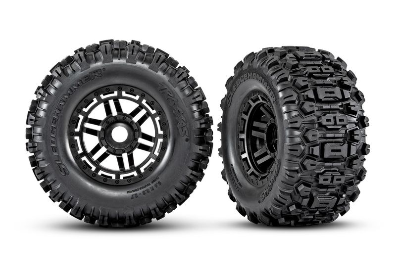 Traxxas Tires &amp; wheels, assembled, glued (black wheels, dual profile (2.8&quot; outer, 3.6&quot; inner), SledgehammerÔøΩ tires, foam inserts) (2) (17mm splined) (TSMÔøΩ rated)