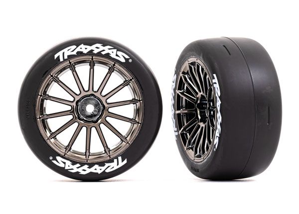 Traxxas Tires &amp; wheels, assembled, glued (multi-spoke black chrome wheels, 2.0&quot; slick tires with TraxxasÔøΩ logo, foam inserts) (front) (2) (VXL rated)