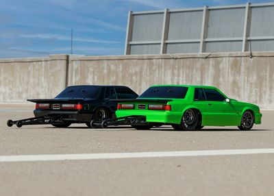 Traxxas Body, Ford Mustang, Fox Body, black (painted, decals applied) (includes side mirrors, wing, wing retainer, rear body mount posts, foam body bumper, &amp; mounting hardware)