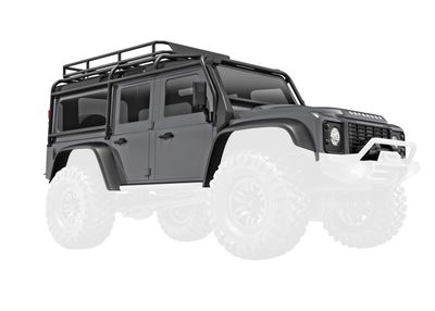 Traxxas Body, Land RoverÔøΩ DefenderÔøΩ, complete, silver (includes grille, side mirrors, door handles, fender flares, fuel canisters, jack, spare tire mount, &amp; clipless mounting) (requires #9734 fron