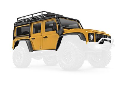 Traxxas Body, Land RoverÔøΩ DefenderÔøΩ, complete, tan (includes grille, side mirrors, door handles, fender flares, fuel canisters, jack, spare tire mount, &amp; clipless mounting) (requires #9734 front &amp;