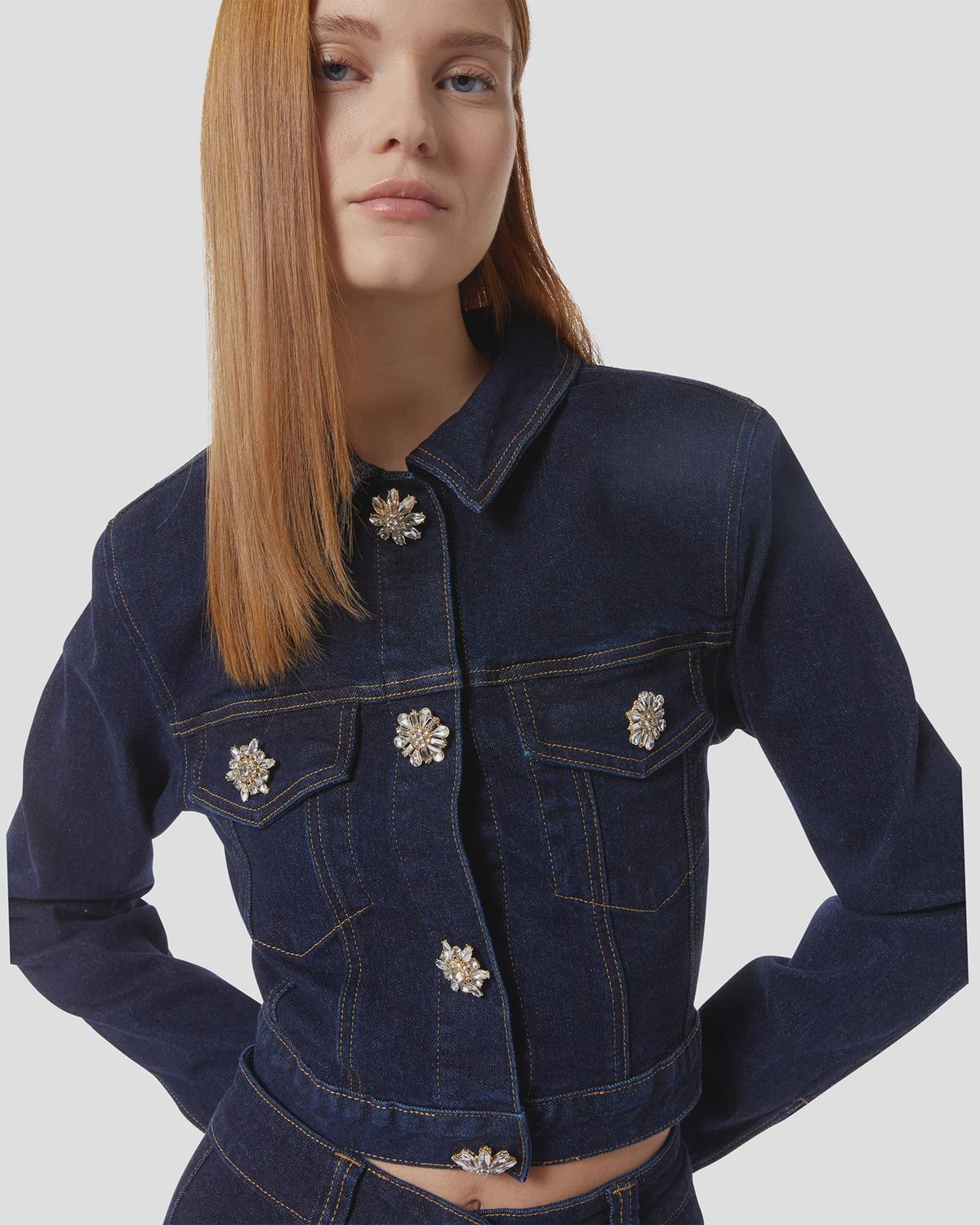 Dark denim jacket with jewel buttons