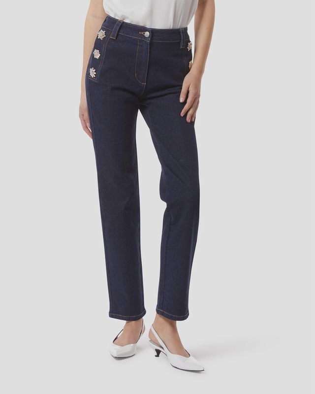 Dark denim jeans with jewel buttons