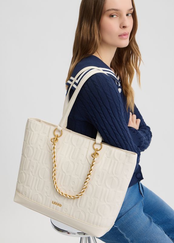 Shopping bag with logo and chain