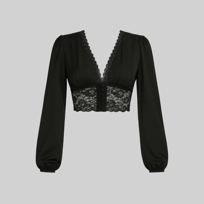 Blusa manga larga con encaje inferior y mangas abombadas