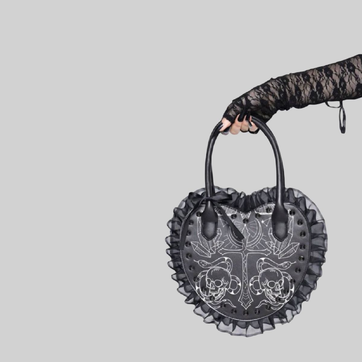 Bolso corazón con estampado de calavera