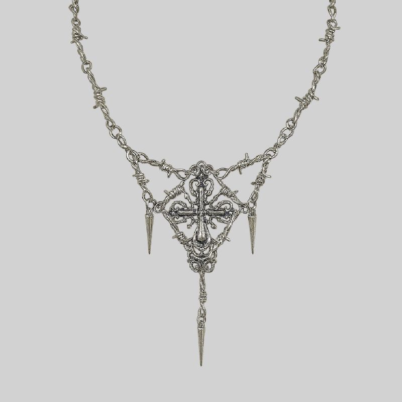 Collar de púas y cruz