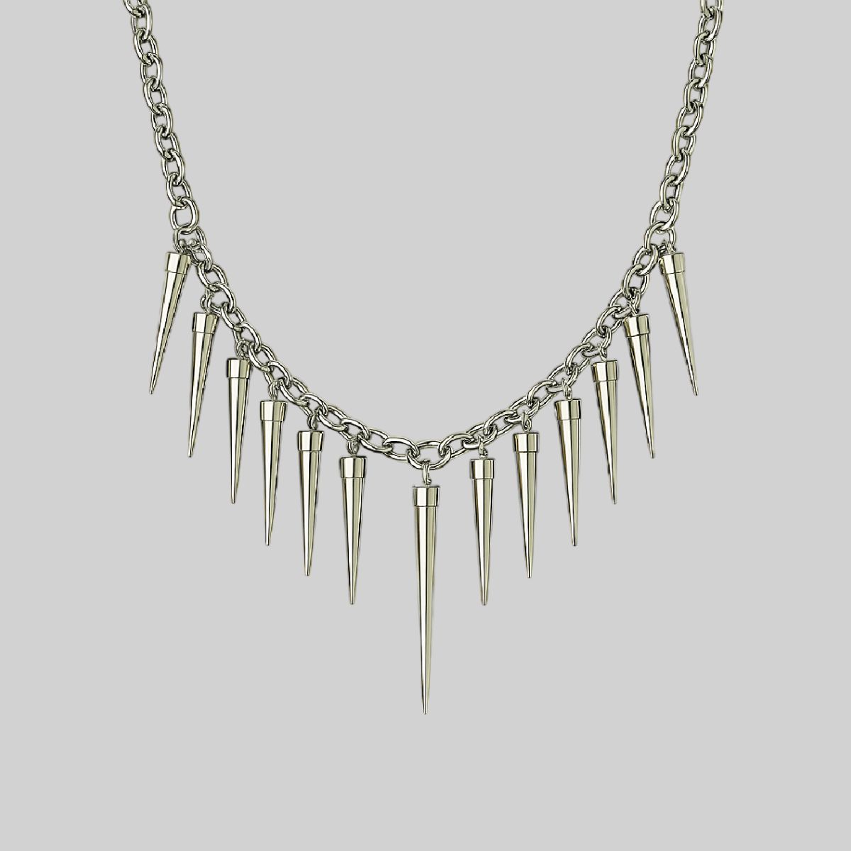 Collar con púas de diferentes tamaños