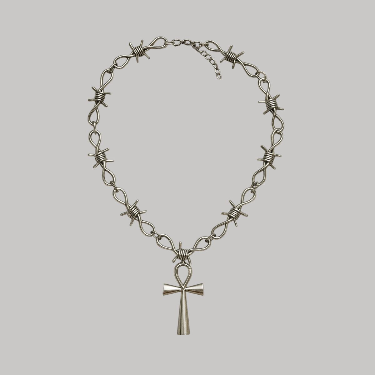 Collar de púas con cruz