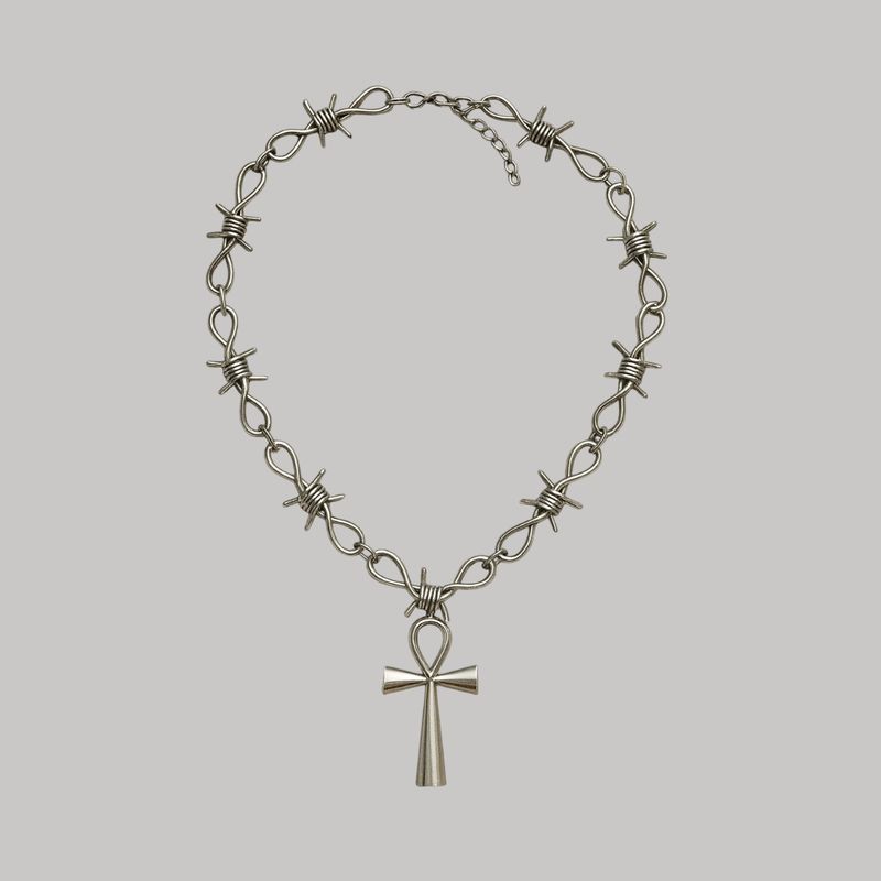 Collar de púas con cruz