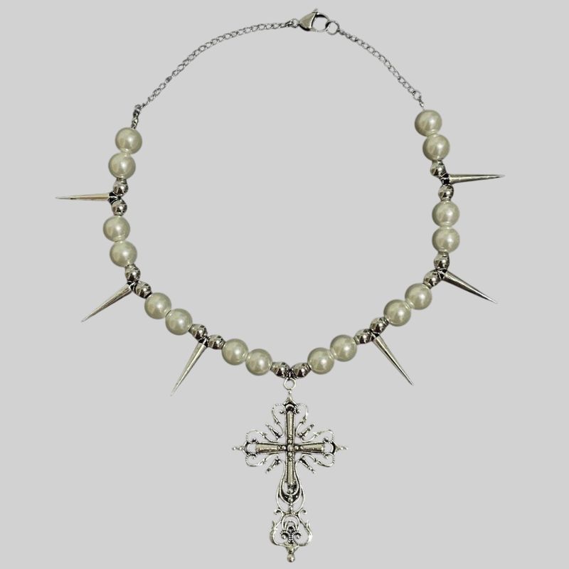 Collar de púas con dije de cruz